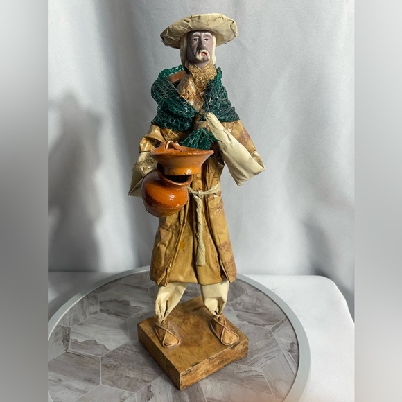 Handcrafted Artisan Figurine with Orange and Green Accents - Picture 2 of 14